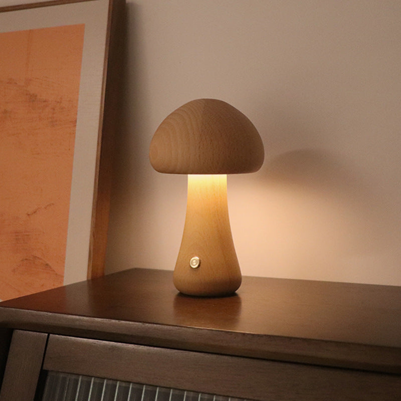 Beech mushroom lamp on a wooden surface with a warm glow.