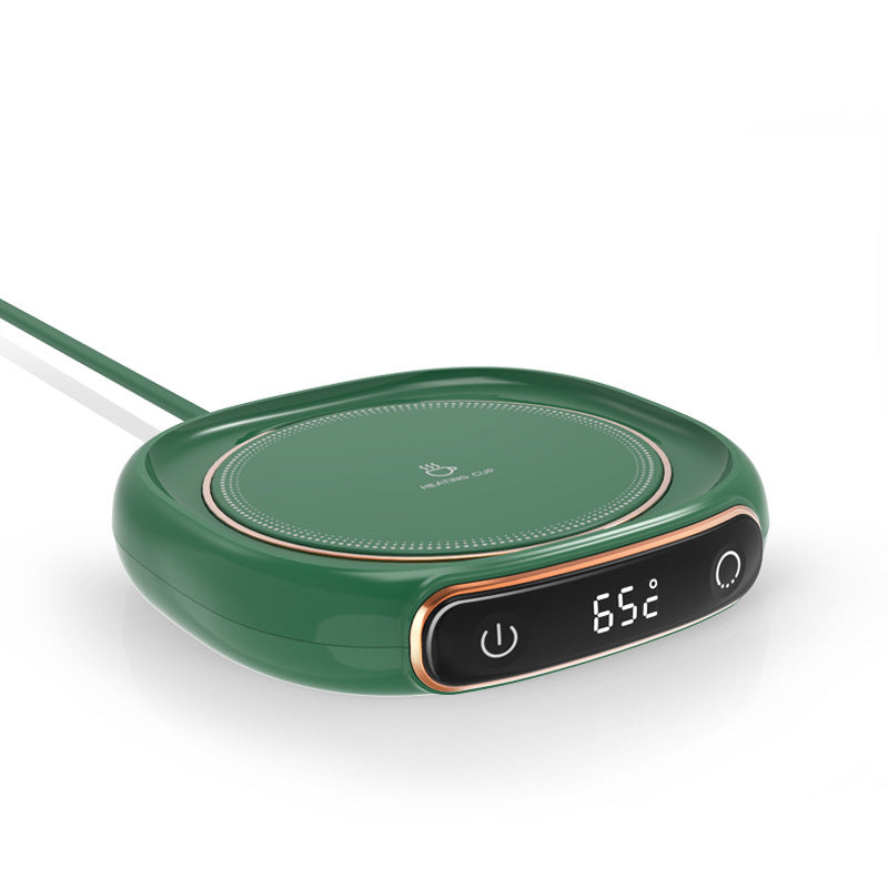 Green electric hot plate with digital display on a white background.