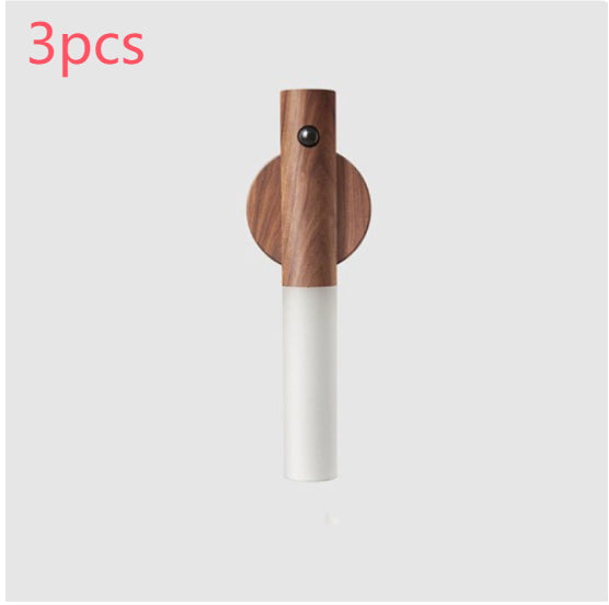 Three dark wooden and white usb night lights on light gray background.