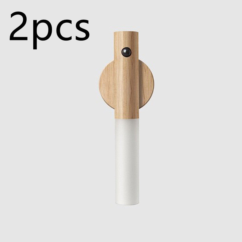 Two light wooden and white usb night lights on light gray background.