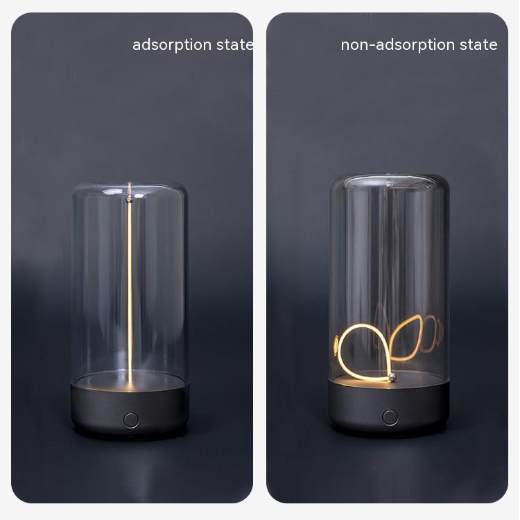 Two states of a device labeled «adsorption state» and «non-adsorption state» with clear cylindrical container and metallic object inside.