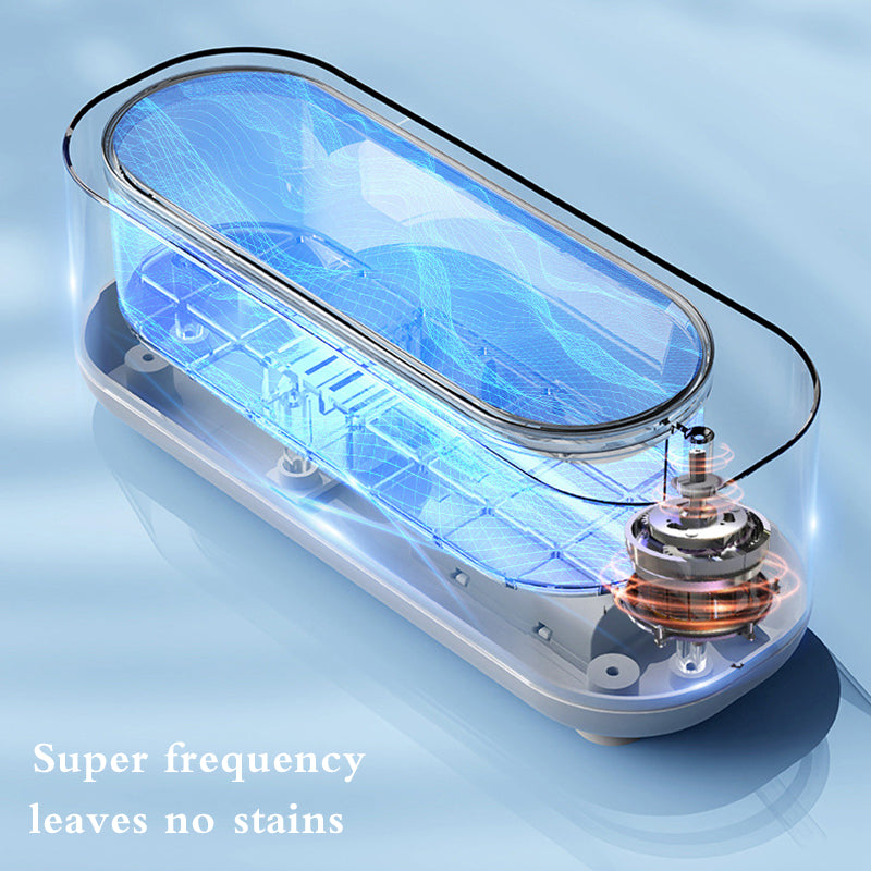 Electrolyzer device with glowing blue interior on a light blue background.