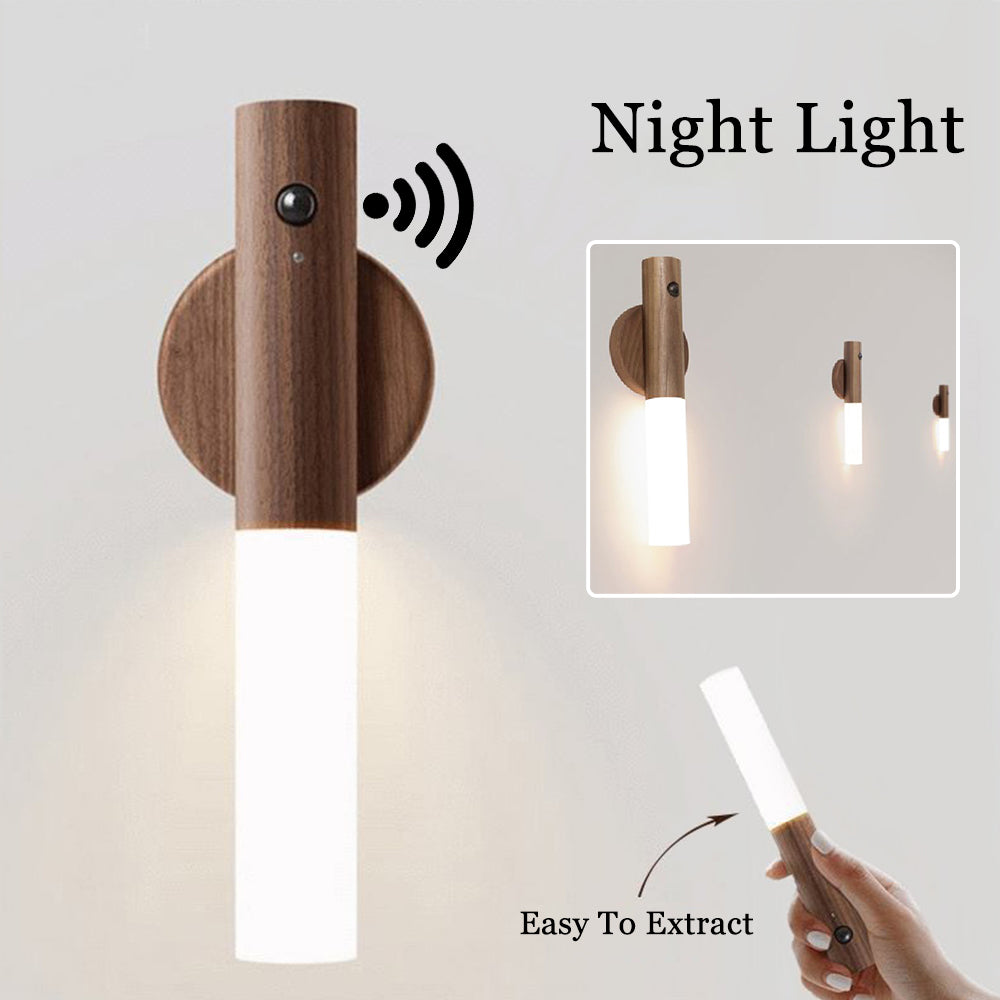 Wooden night light with remote control on gray background.